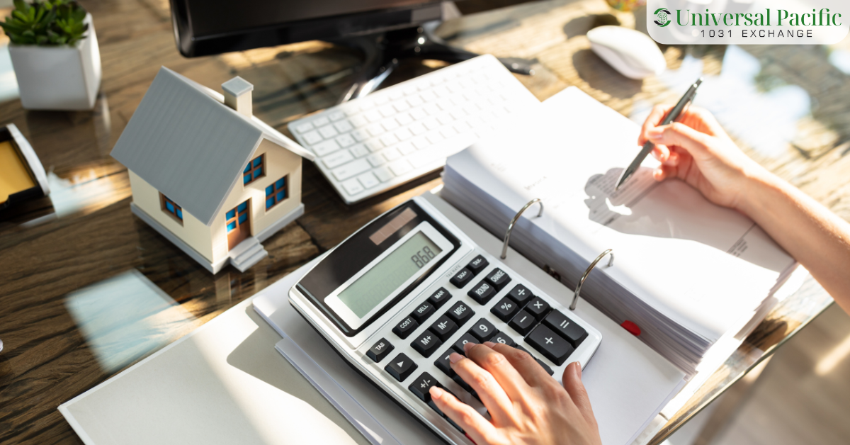 Calculator and model house used to estimate NJ capital gains tax on a real estate sale