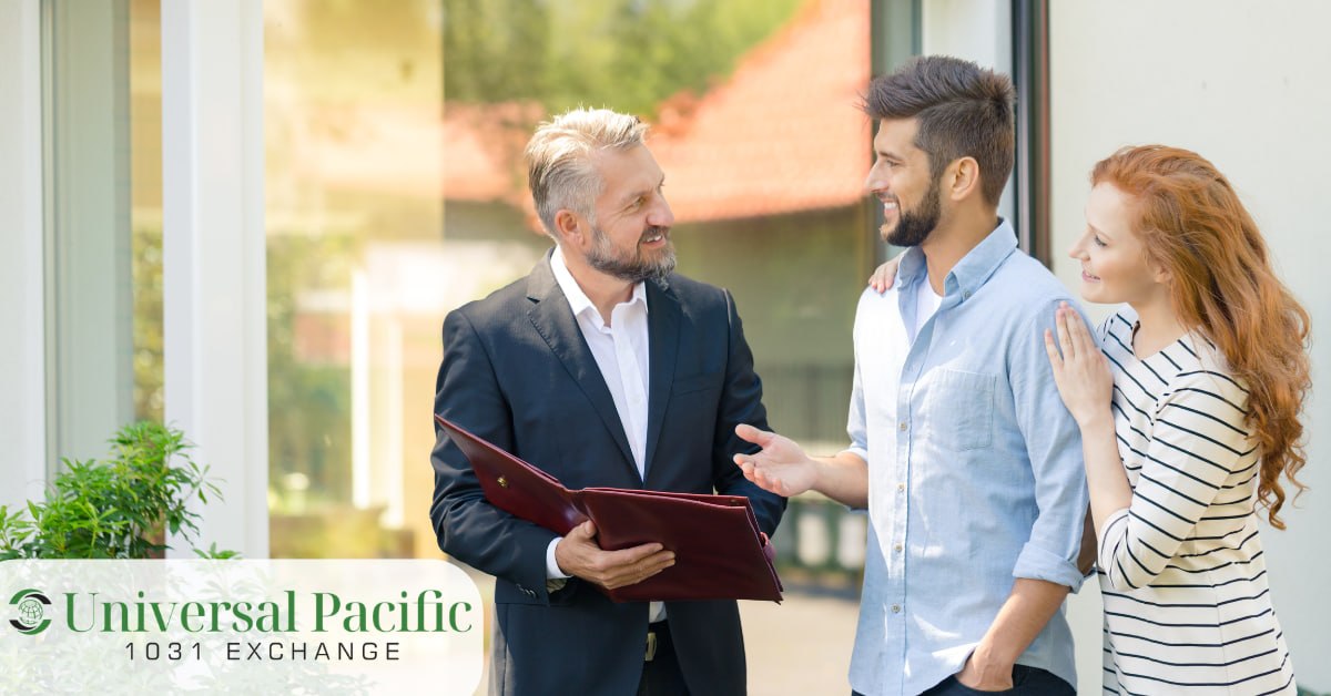 Real estate advisor reviewing investment documents with a couple outside a property