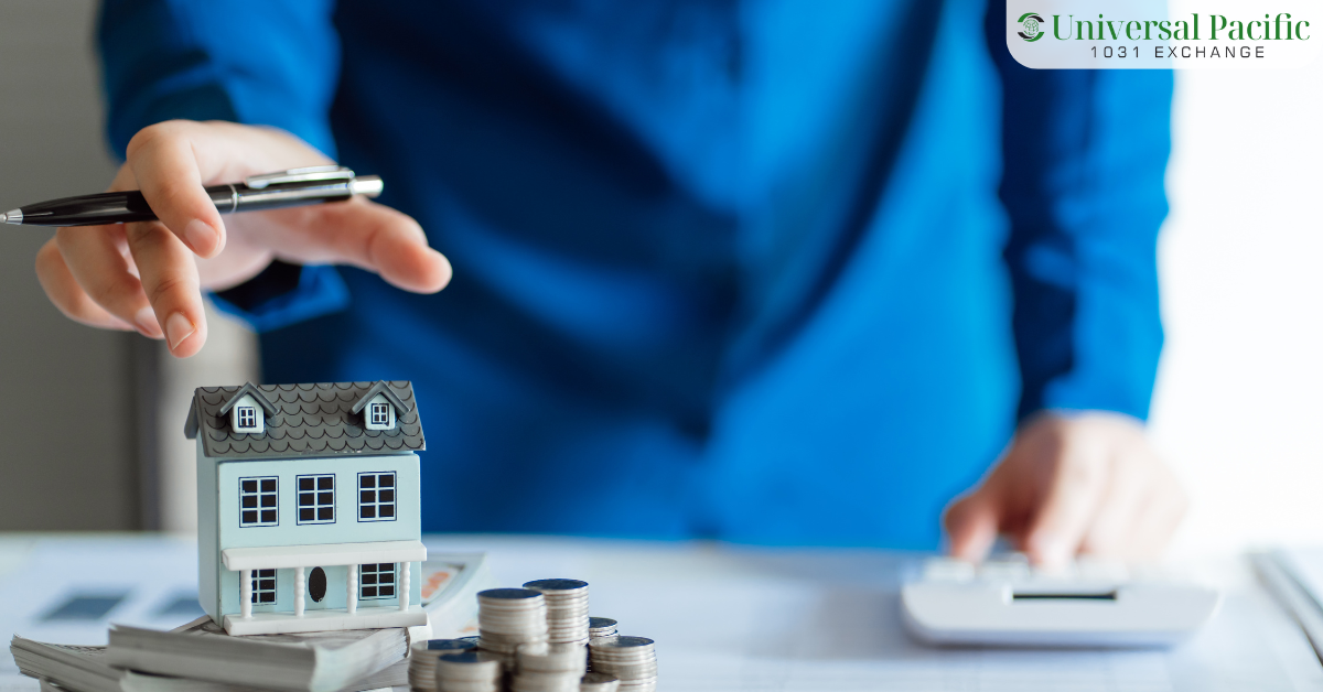 Model house on stacked coins with a calculator, illustrating ways to reduce NJ capital gains tax