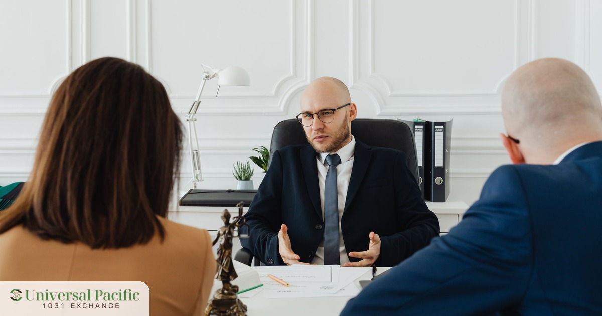 A real estate investor meeting with a 1031 exchange advisor across a desk