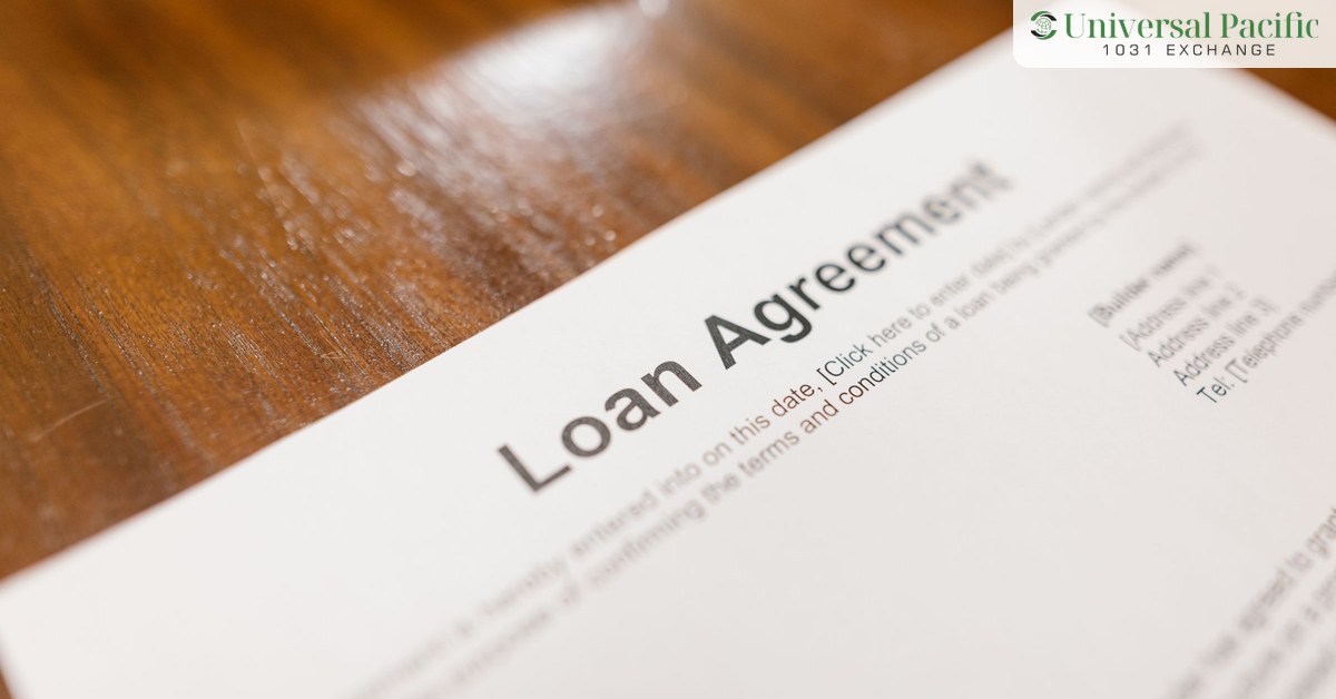 Loan agreement paperwork on a desk, illustrating debt in a 1031 exchange