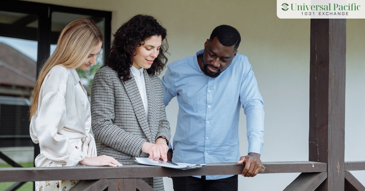 Real estate professional explaining exchange paperwork to a couple