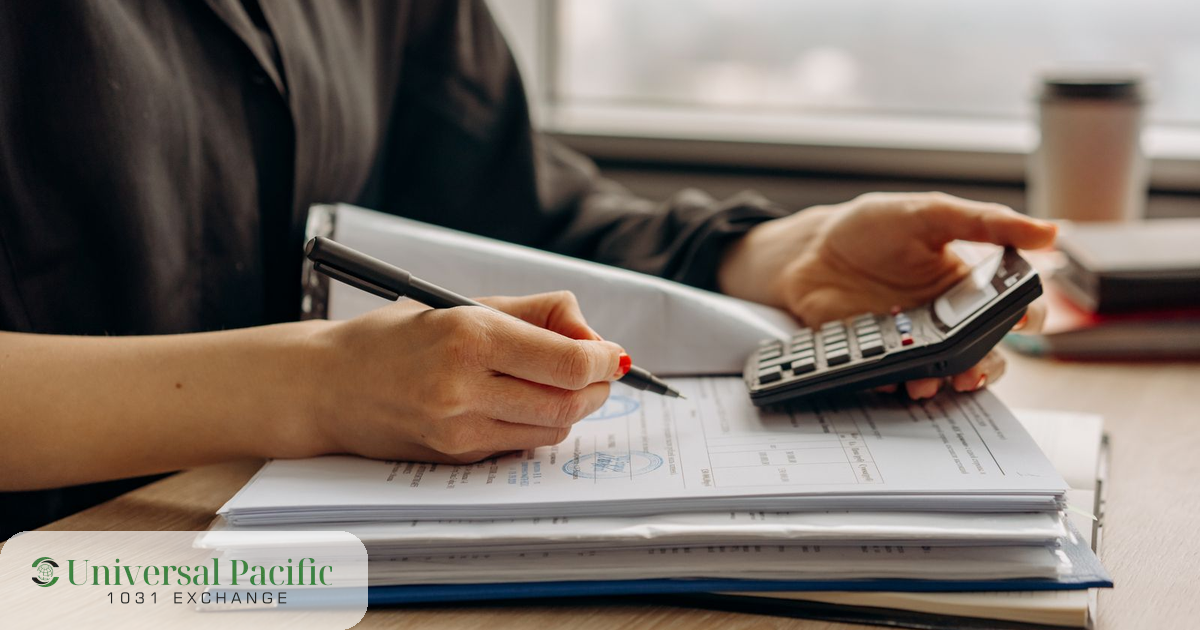 Investor reviewing financial documents with a calculator while planning 1031 exchange capital gains deferral and deadlines.